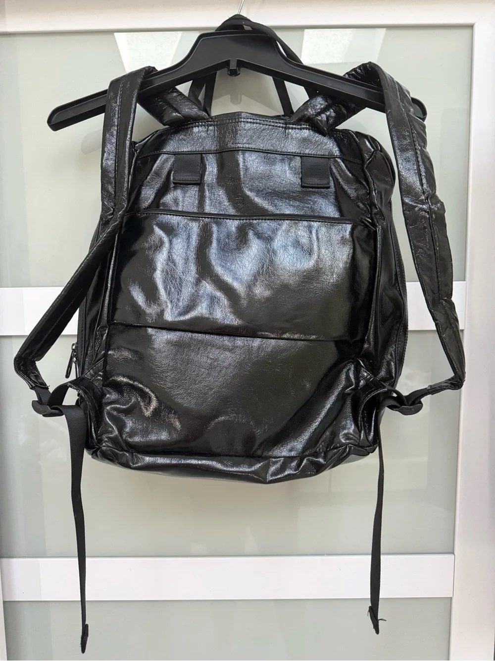 Sleek Shiny Black Leather Backpack
